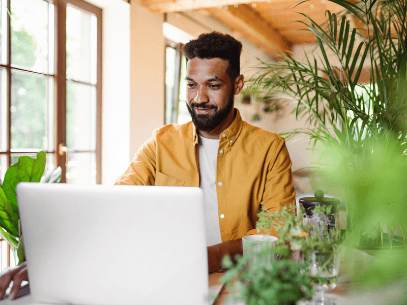image-customer-story-southwest-tribe-man-at-a-computer.png